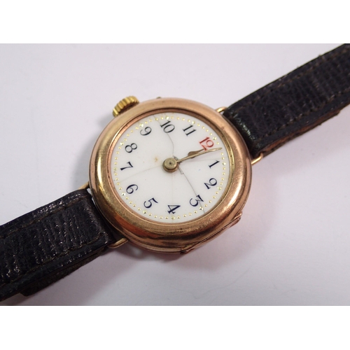 457 - An Edwardian 9 carat gold ladies watch