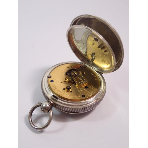 473 - A Waltham silver 'The Farringdon' pocket watch with key and metal case