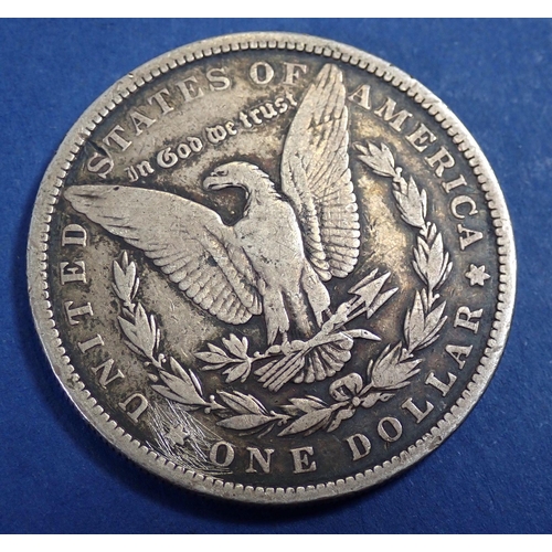 500 - An 1883 USA Morgan silver dollar