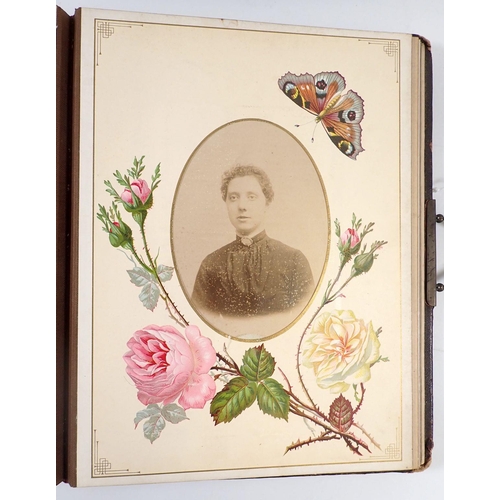 534 - A Victorian photo album featuring members of the 'Bell' family, some within printed vignettes and de... 