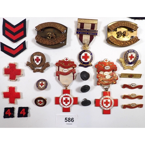 586 - A selection of Red Cross medals, badges etc.