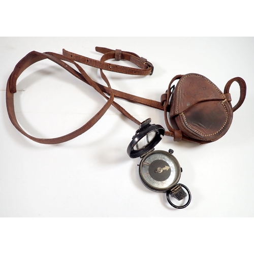 616 - A WWI compass in original leather case, inscribed Captain F G Palmer