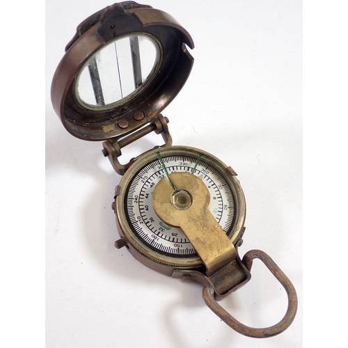 617 - A WWI escape kite in cylinder tube and a compass in leather case