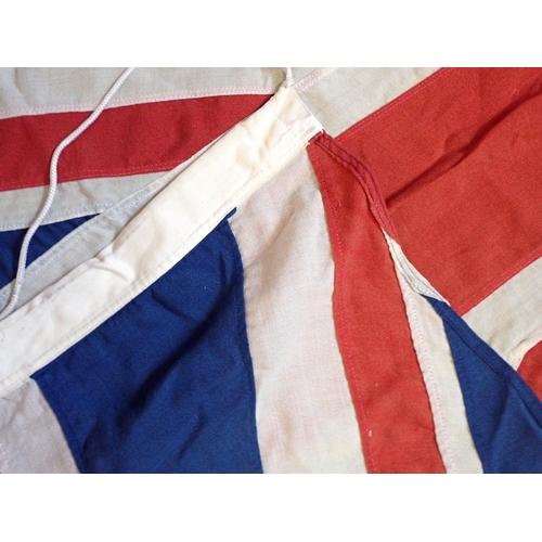 630 - A vintage fabric British Union Jack flag, 182 x 93cm