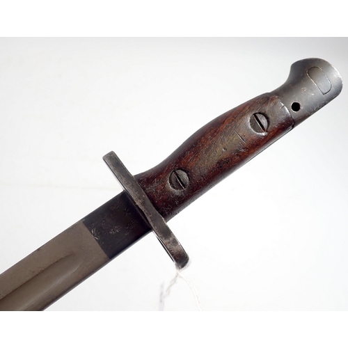 634 - A WWI British bayonet by Sanders, dated 1907 with parkerized blade, wooden handle and  scabbard, bla... 