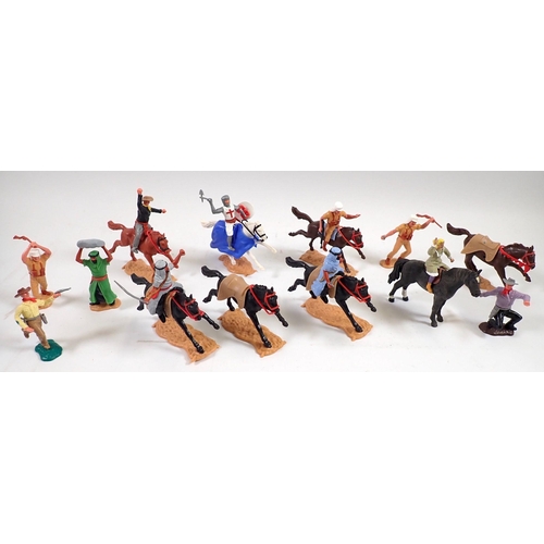 692 - A group of Timpo Toys cowboys, Arabs on horseback, Knight etc.