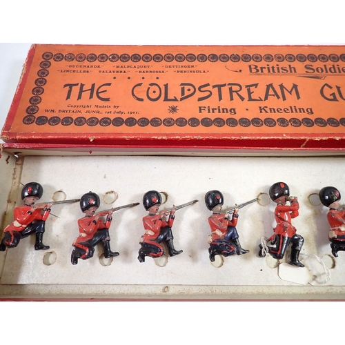 694 - A Britains boxed military set, The Coldstream Guards No 120 1st July 1901, nine kneeling firing sold... 