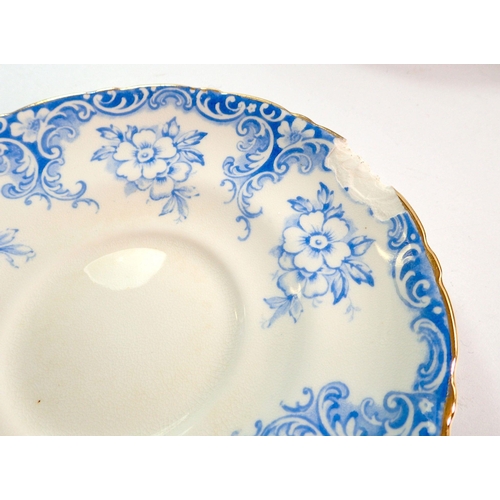 73 - An Edwardian Cauldon blue floral tea service comprising twelve cups and saucers and twelve tea plate... 