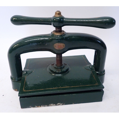 946 - A Victorian Palmer & Howe green cast iron book press, 40cm wide - not suitable for posting!