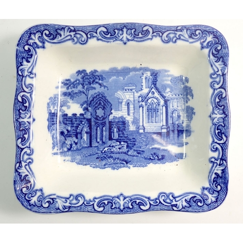 24 - An Abbey blue and white Shredded Wheat dish and a 19th century willow pattern sauce tureen and lid