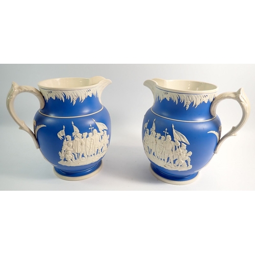 3 - A pair of Copeland blue stoneware large Columbus commemorative jugs 1492-1892, 20.5cm tall, one a/f