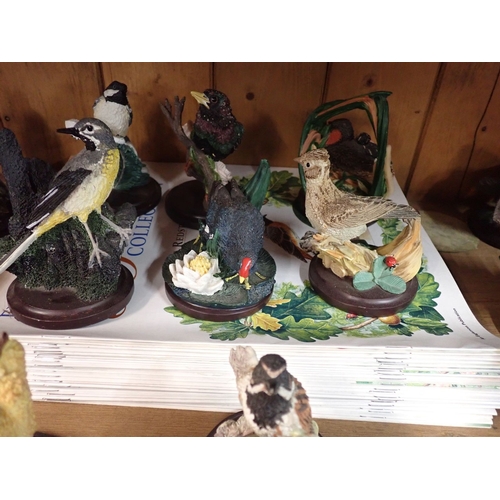 44 - A Country Bird collection of bird ornaments together with a set of matching magazines