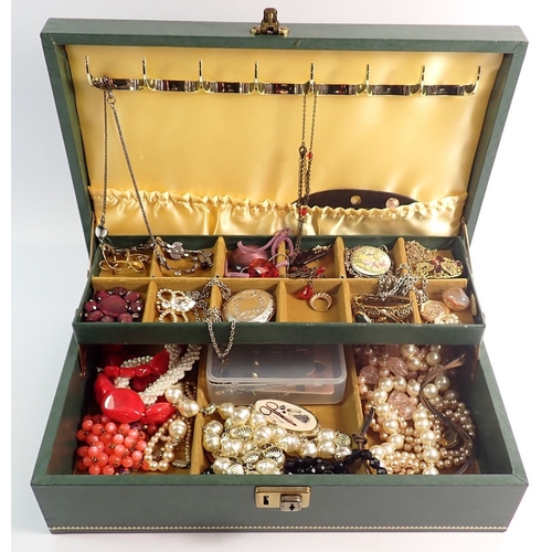 516 - A box of various costume jewellery including octagonal 9 carat gold front and back engraved heart lo... 