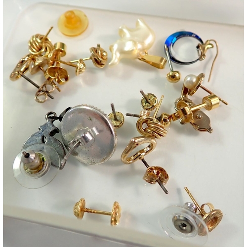 516 - A box of various costume jewellery including octagonal 9 carat gold front and back engraved heart lo... 