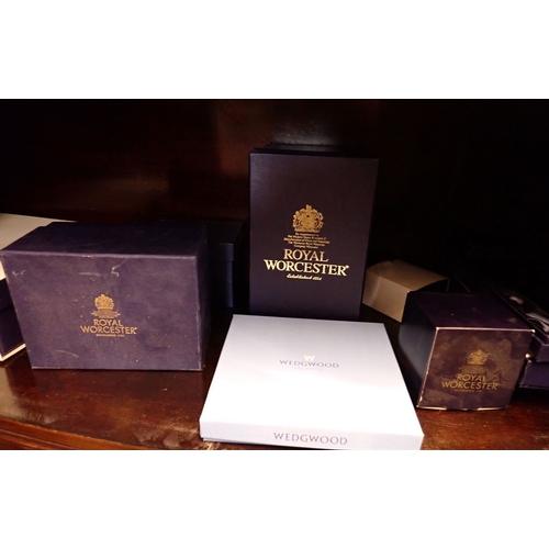 16 - A group of Royal Worcester commemorative items including Silver Wedding cup and plate, Millenium bow... 