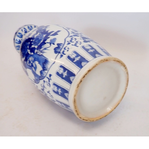 17 - A large Chinese blue and white vase painted birds and flowers, 63cm tall
