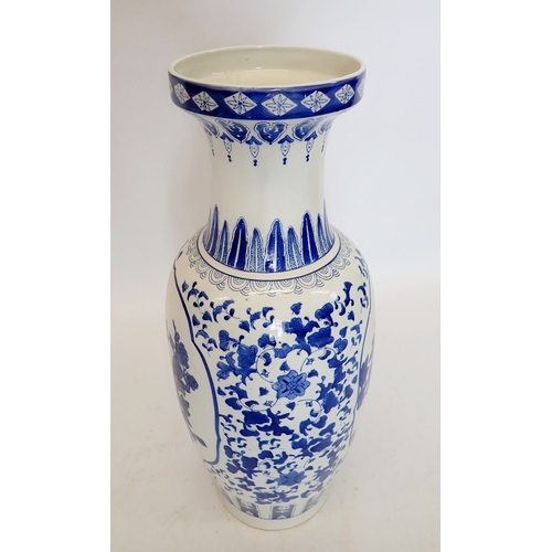 17 - A large Chinese blue and white vase painted birds and flowers, 63cm tall