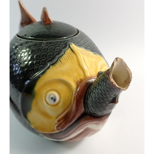 23 - A Victorian Majolica teapot in the form of a fish - spout a/f, 26cm long