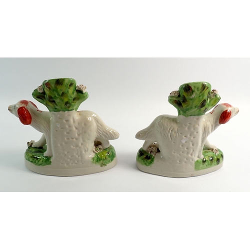 27 - A pair of Victorian style flat back Staffordshire dogs, 17cm tall