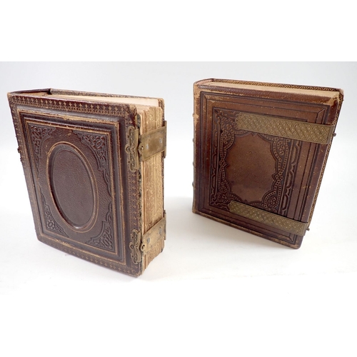 655 - Two Victorian photograph albums and contents of Carte de Visite, fifty four photographs in total