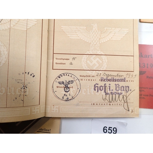 659 - A group of German WWII ID papers and passes