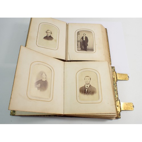 655 - Two Victorian photograph albums and contents of Carte de Visite, fifty four photographs in total