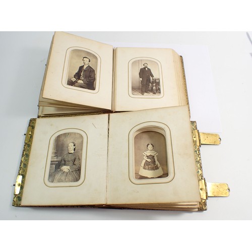 655 - Two Victorian photograph albums and contents of Carte de Visite, fifty four photographs in total