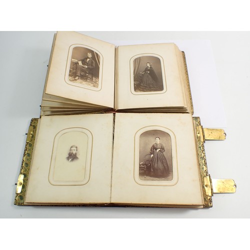 655 - Two Victorian photograph albums and contents of Carte de Visite, fifty four photographs in total