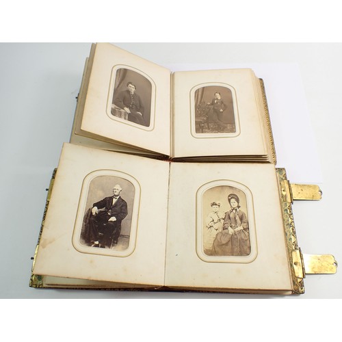 655 - Two Victorian photograph albums and contents of Carte de Visite, fifty four photographs in total