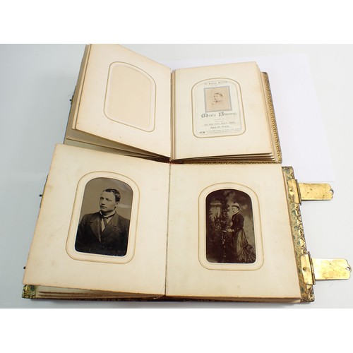 655 - Two Victorian photograph albums and contents of Carte de Visite, fifty four photographs in total
