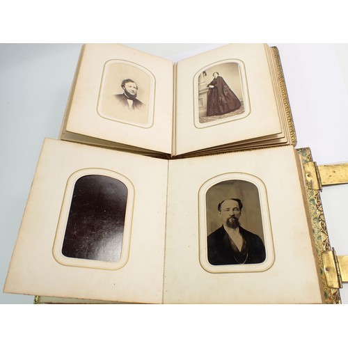 655 - Two Victorian photograph albums and contents of Carte de Visite, fifty four photographs in total