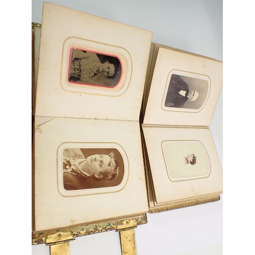 655 - Two Victorian photograph albums and contents of Carte de Visite, fifty four photographs in total