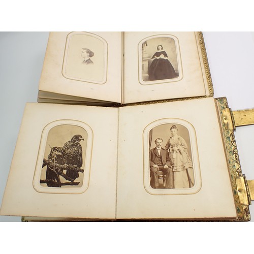655 - Two Victorian photograph albums and contents of Carte de Visite, fifty four photographs in total