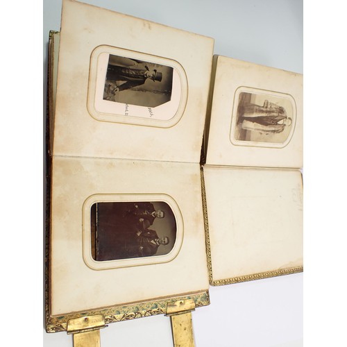 655 - Two Victorian photograph albums and contents of Carte de Visite, fifty four photographs in total