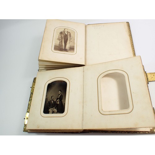 655 - Two Victorian photograph albums and contents of Carte de Visite, fifty four photographs in total