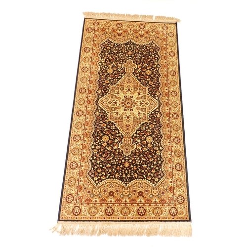 A Prado Keshan machine made wool rug 180 x 90cm