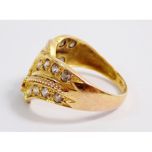 270 - A gold and paste ring marked 700, size N, 4.6g