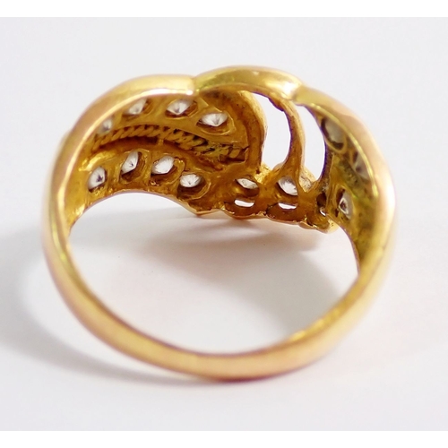 270 - A gold and paste ring marked 700, size N, 4.6g