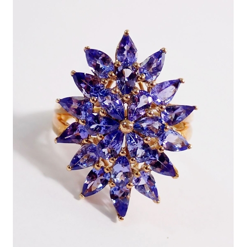 274 - A 9ct gold large starburst design tanzanite ring, 4.5g, size N, 2.8 x 1.5cm