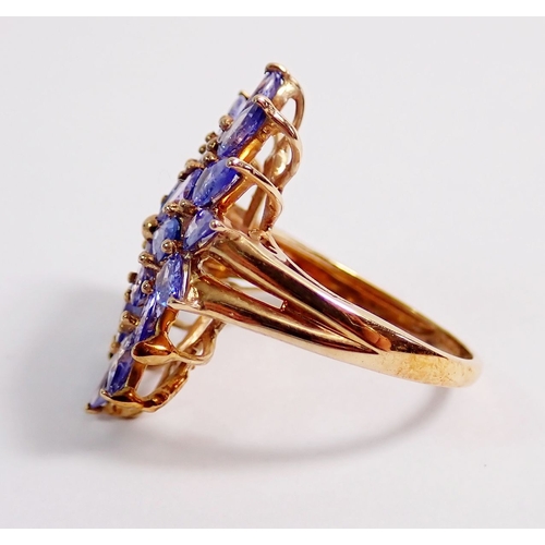 274 - A 9ct gold large starburst design tanzanite ring, 4.5g, size N, 2.8 x 1.5cm