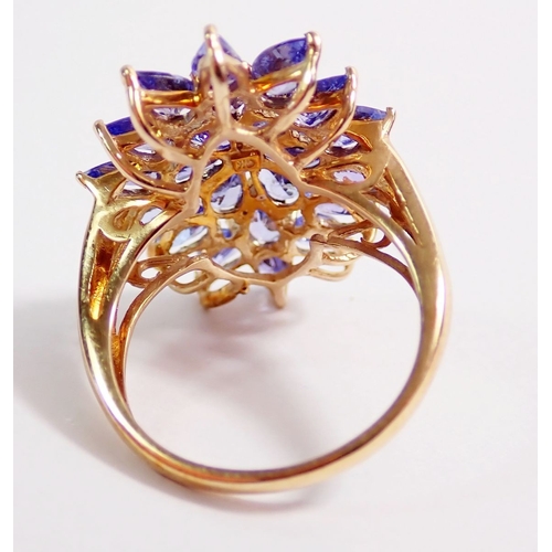 274 - A 9ct gold large starburst design tanzanite ring, 4.5g, size N, 2.8 x 1.5cm