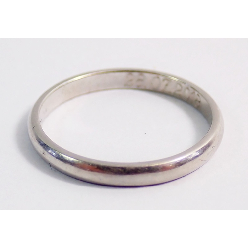 275 - A platinum wedding band, 2.4g size J to K