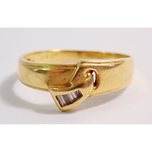 279 - An 18 carat gold and diamond set belt loop design ring, size O-P, 3g
