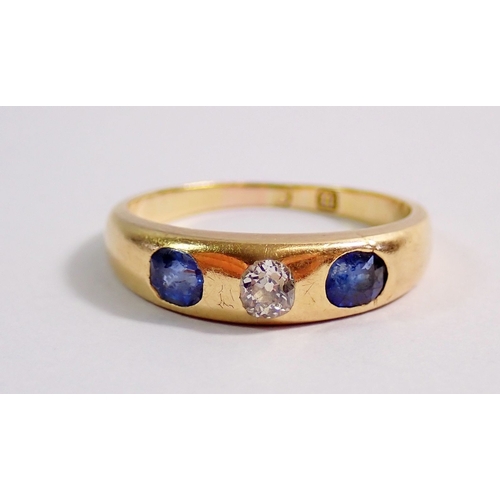 280 - An 18 carat gold sapphire and diamond gypsy ring, 3.9g, size M
