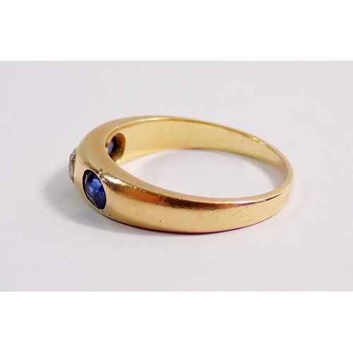 280 - An 18 carat gold sapphire and diamond gypsy ring, 3.9g, size M