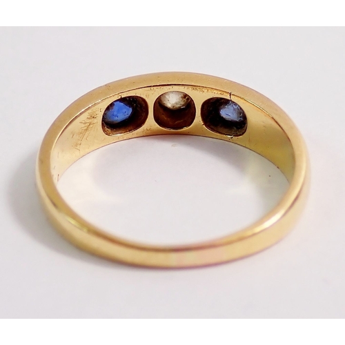 280 - An 18 carat gold sapphire and diamond gypsy ring, 3.9g, size M