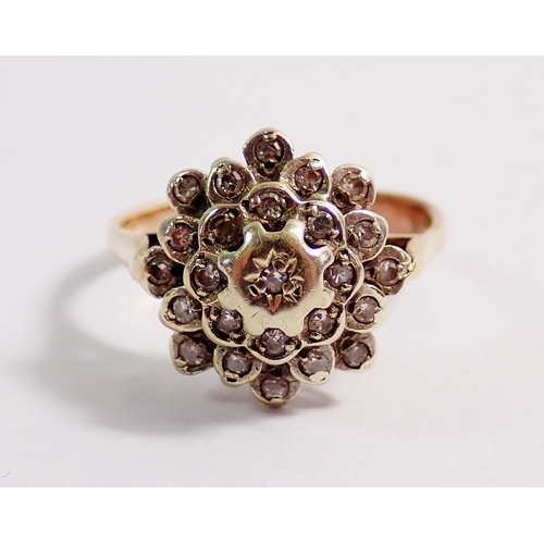 284 - A 9 carat gold and diamond chip cluster ring, size K, 2.8g, unmarked but tested