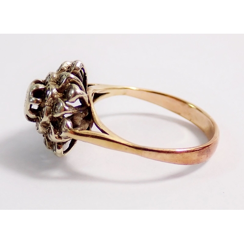 284 - A 9 carat gold and diamond chip cluster ring, size K, 2.8g, unmarked but tested