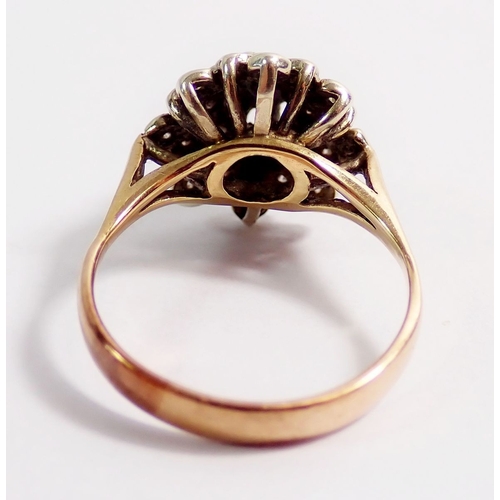284 - A 9 carat gold and diamond chip cluster ring, size K, 2.8g, unmarked but tested