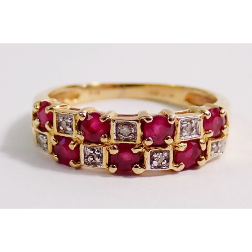 287 - A 9ct gold ring set seven rubies and seven illusion set diamonds, size K, 2.3g